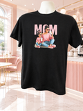 Custom Graphic T-Shirt- featuring a mother-and-daughter design; both are wearing sweaters and pink shoes, with the word "MOM" in pink.