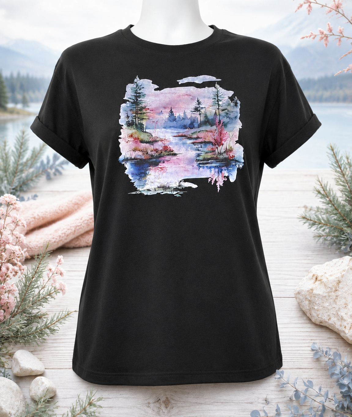 Custom Graphic T-Shirt-featuring a landscape design with a pinkish-water background and pine trees.