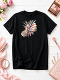Custom Graphic T-shirt- featuring a design of hands wearing bracelets and holding manicure supplies.